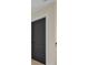 Hallway featuring a sleek, modern, black door with white trim at 1141 Harper Lee Dr, Newton, NC 28658