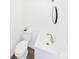 Compact powder room with modern fixtures and a clean, minimalist design, providing a convenient space at 120 Hepler Rd, Taylorsville, NC 28681