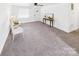 Open-concept living area with freshly-cleaned carpet and natural light at 120 Hepler Rd, Taylorsville, NC 28681