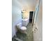 Functional bathroom with tiled floors, a toilet, and a single sink vanity at 13416 Four Oaks Ln, Matthews, NC 28105
