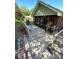 Outdoor deck area perfect for entertaining with grill, bench seating, and screened porch access at 13416 Four Oaks Ln, Matthews, NC 28105