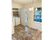 Laundry area with shelving, washer and dryer near the breakfast nook at 13416 Four Oaks Ln, Matthews, NC 28105