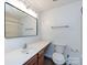 Bathroom featuring modern vanity, sink and medicine cabinet above toilet at 1348 Green Oaks Ln # L, Charlotte, NC 28205