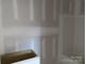 The bathroom features smooth walls and modern fixtures that contribute to a clean and functional space at 145 Mason Tanner Ct, Rock Hill, SC 29730