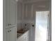 Bathroom with vanity, cabinetry, and fixtures ready for finishing touches at 145 Mason Tanner Ct, Rock Hill, SC 29730