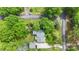 Overhead view of the property, highlighting the home, garage, and lush greenery at 15333 Catawba S Cir, Matthews, NC 28104