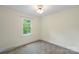 Neutral bedroom with natural light, carpet flooring, and ceiling fan at 15333 Catawba S Cir, Matthews, NC 28104