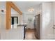 Bright kitchen featuring white cabinets, stainless steel appliances and quartz countertops at 15333 Catawba S Cir, Matthews, NC 28104