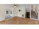 Open living space with hardwood floors and stairs to the upper level at 15333 Catawba S Cir, Matthews, NC 28104