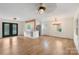 Spacious living area showcasing hardwood floors and an open layout at 15333 Catawba S Cir, Matthews, NC 28104