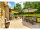 Inviting back deck featuring comfortable wicker seating, a pergola, and a tranquil outdoor setting at 1655 Essex Hall Dr, Rock Hill, SC 29730