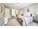This bedroom offers ample space, neutral carpet, and space for a desk at 1655 Essex Hall Dr, Rock Hill, SC 29730