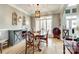 Elegant dining room with wainscoting, light fixture, and furniture at 1655 Essex Hall Dr, Rock Hill, SC 29730