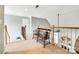 This hallway features a wooden bench with a view of the home's entry and staircase at 1655 Essex Hall Dr, Rock Hill, SC 29730