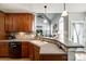 Beautiful kitchen with granite countertops, wooden cabinets, and stainless-steel appliances at 1655 Essex Hall Dr, Rock Hill, SC 29730