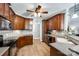 Charming kitchen featuring wooden cabinets, tiled backsplash, and modern appliances at 1655 Essex Hall Dr, Rock Hill, SC 29730