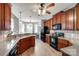 Bright kitchen with stainless steel appliances, dark wood cabinets, and a breakfast nook at 1655 Essex Hall Dr, Rock Hill, SC 29730