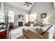 Spacious living room featuring vaulted ceilings, a fireplace, and comfortable seating at 1655 Essex Hall Dr, Rock Hill, SC 29730