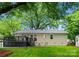 Back of home showing deck and spacious back yard at 1700 Emerywood Dr, Charlotte, NC 28210