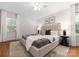 Bright and spacious main bedroom showcasing large bed, rug, and lots of natural light at 1700 Emerywood Dr, Charlotte, NC 28210