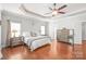 Bright main bedroom with hardwood floors and elegant mirrored dressers at 2441 Chatham Dr, Fort Mill, SC 29707