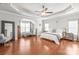 Spacious main bedroom with hardwood floors, tray ceilings, and a sitting area at 2441 Chatham Dr, Fort Mill, SC 29707