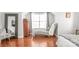 Sitting area in a bedroom with hardwood floors and a chaise lounge at 2441 Chatham Dr, Fort Mill, SC 29707