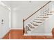 Bright foyer showcases a staircase with wooden handrail and white spindles at 2441 Chatham Dr, Fort Mill, SC 29707