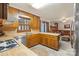 Well-lit kitchen with modern appliances, plenty of cabinet space, and a clear view into the Gathering room at 301 Museum Rd, Statesville, NC 28625