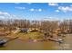 Overhead shot capturing the property's extensive landscaping, lake access, and private docks at 3062 Bass Dr, Sherrills Ford, NC 28673
