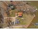 Aerial view of the property showcasing lush landscaping, private docks, and waterfront living at 3062 Bass Dr, Sherrills Ford, NC 28673