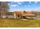 Charming home featuring a metal roof, a carport, and scenic lake views at 3062 Bass Dr, Sherrills Ford, NC 28673