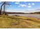 Lakefront property featuring a private dock, peaceful water views, and lakeside tranquility at 3062 Bass Dr, Sherrills Ford, NC 28673