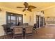 Inviting outdoor seating area featuring an elegant ceiling fan and access to the lake views at 3062 Bass Dr, Sherrills Ford, NC 28673