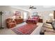 Bright bedroom with a comfortable sitting area and plenty of natural light at 3537 Plum St, Fort Mill, SC 29715