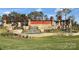Community entrance with waterfall, stone accents, and lush landscaping at 3537 Plum St, Fort Mill, SC 29715