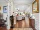 Open-concept living room featuring hardwood floors and plenty of natural light at 3537 Plum St, Fort Mill, SC 29715