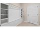 Bright mudroom features built-in shelving and a convenient coat rack at 3537 Plum St, Fort Mill, SC 29715