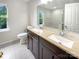 Bathroom featuring double sinks with granite countertops at 3600 Sipes Ln, Charlotte, NC 28269