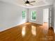 Bright bedroom with hardwood floors and closet at 3600 Sipes Ln, Charlotte, NC 28269