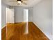 Bedroom with wood floors and two doors at 3600 Sipes Ln, Charlotte, NC 28269