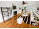 Bright living room with hardwood floors, fireplace, and modern furnishings at 3600 Sipes Ln, Charlotte, NC 28269