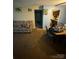Open concept living room showcasing seamless flow to kitchen and dining area at 417 Orchard Trace Ln # 6, Charlotte, NC 28213