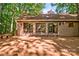 House with multiple glass sliding doors to the back deck, making indoor-outdoor living easy at 46 Timberidge Dr, Lake Wylie, SC 29710