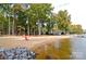 Scenic beach featuring inviting sandy shores and views of the water, creating a serene lakeside atmosphere at 46 Timberidge Dr, Lake Wylie, SC 29710