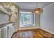 Bright breakfast nook with stained glass light and view of backyard at 46 Timberidge Dr, Lake Wylie, SC 29710