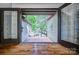 Spacious entryway featuring double doors opening to brick patio at 46 Timberidge Dr, Lake Wylie, SC 29710