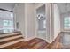 Hallway with hardwood floors leading to a bedroom and a living room at 46 Timberidge Dr, Lake Wylie, SC 29710