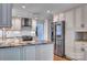 Spacious kitchen with stainless steel appliances, granite countertops and ample storage at 46 Timberidge Dr, Lake Wylie, SC 29710