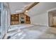 Open living room featuring a vaulted ceiling and fireplace at 46 Timberidge Dr, Lake Wylie, SC 29710